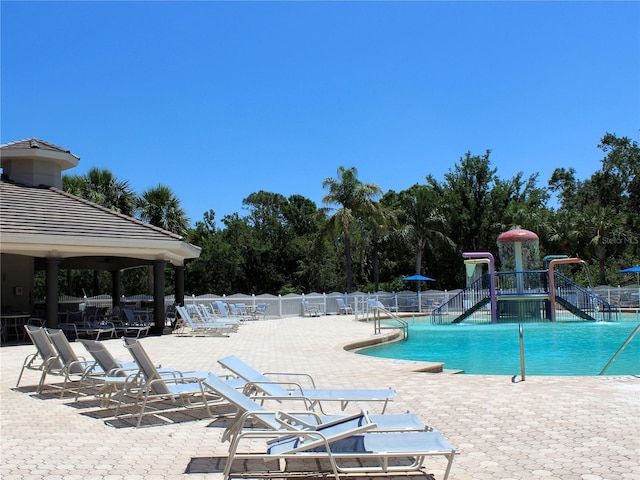 406 Petrel Trl, Bradenton, FL 34212 - community pool with a gazebo, a patio, and fence