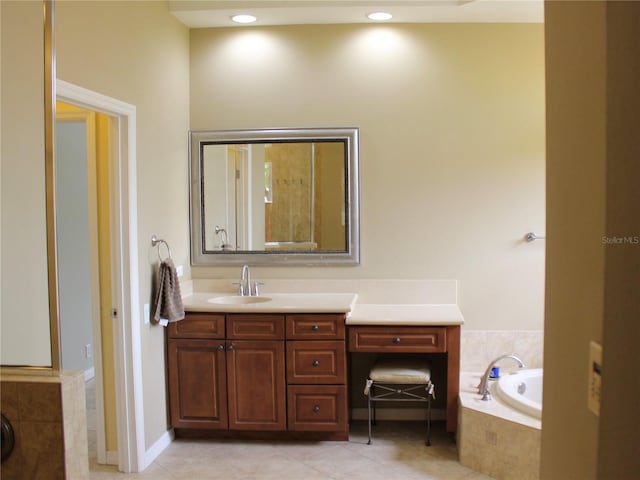 406 Petrel Trl, Bradenton, FL 34212 - full bathroom with a garden tub, tile patterned flooring, and vanity