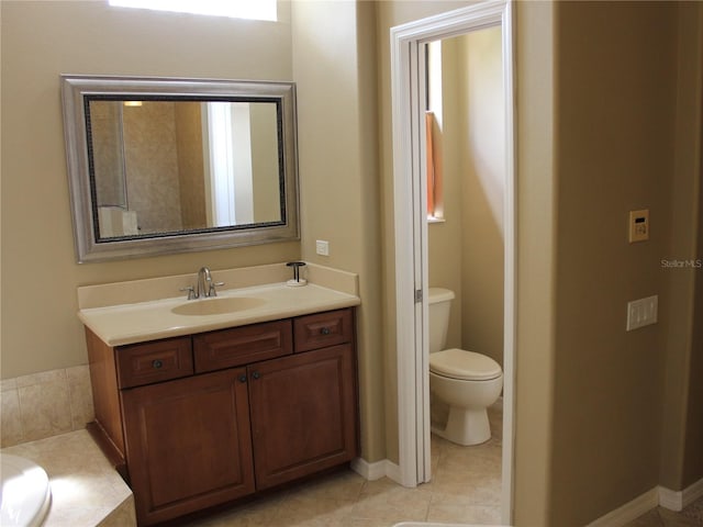 406 Petrel Trl, Bradenton, FL 34212 - bathroom with tile patterned flooring, toilet, vanity, and a bathing tub