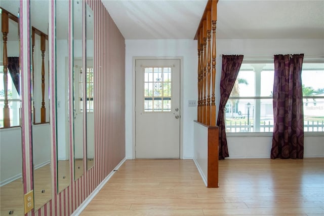 1315 Bottlebrush Dr, Bradenton, FL 34208 - doorway to outside featuring light wood-style flooring