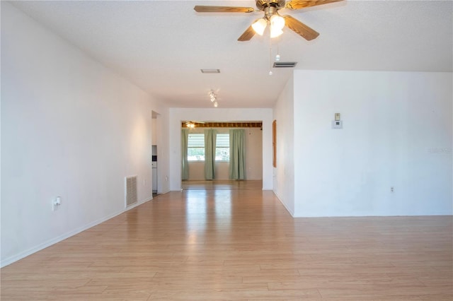1315 Bottlebrush Dr, Bradenton, FL 34208 - empty room featuring visible vents, ceiling fan, and light wood-type flooring