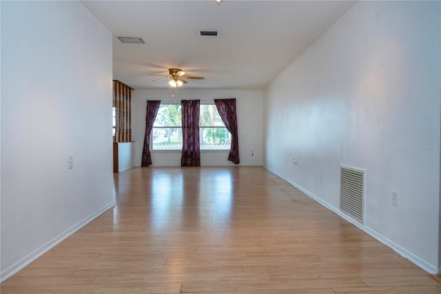 1315 Bottlebrush Dr, Bradenton, FL 34208 - spare room with light wood-type flooring, a ceiling fan, and visible vents