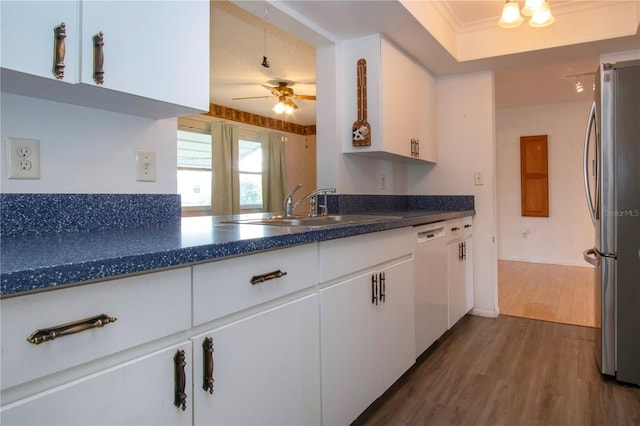 1315 Bottlebrush Dr, Bradenton, FL 34208 - kitchen featuring a sink, a ceiling fan, freestanding refrigerator, white dishwasher, and dark wood-style flooring