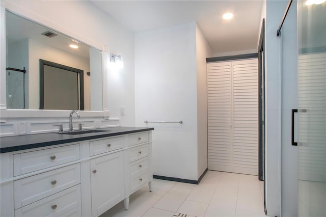 1315 Bottlebrush Dr, Bradenton, FL 34208 - bathroom with vanity, a closet, visible vents, and recessed lighting