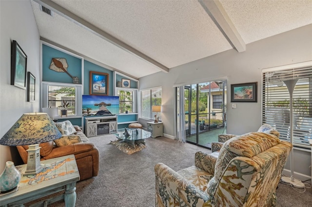 living area featuring a textured ceiling, carpet flooring, vaulted ceiling with beams, and baseboards