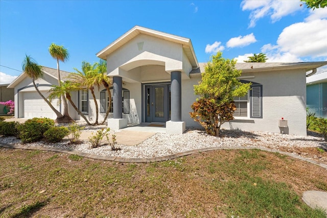 4219 Eastlake Ct, Port Charlotte, FL 33948 - view of front of property featuring an attached garage and stucco siding