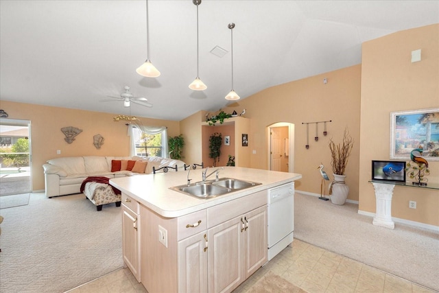 4219 Eastlake Ct, Port Charlotte, FL 33948 - kitchen with dishwasher, a sink, light countertops, a ceiling fan, and light colored carpet