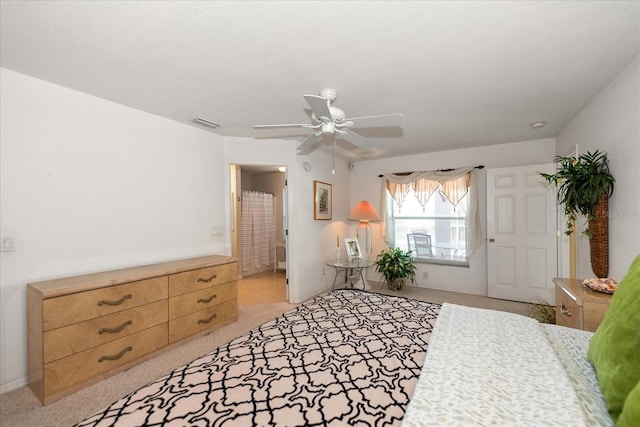 4219 Eastlake Ct, Port Charlotte, FL 33948 - bedroom with light carpet, visible vents, baseboards, and a ceiling fan