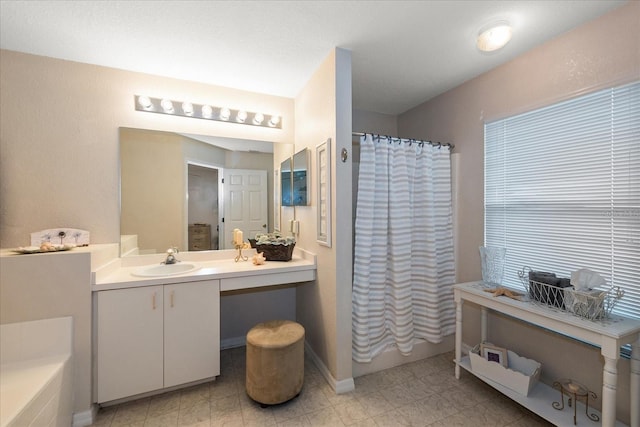 4219 Eastlake Ct, Port Charlotte, FL 33948 - full bathroom featuring a shower with shower curtain, vanity, a tub, and baseboards