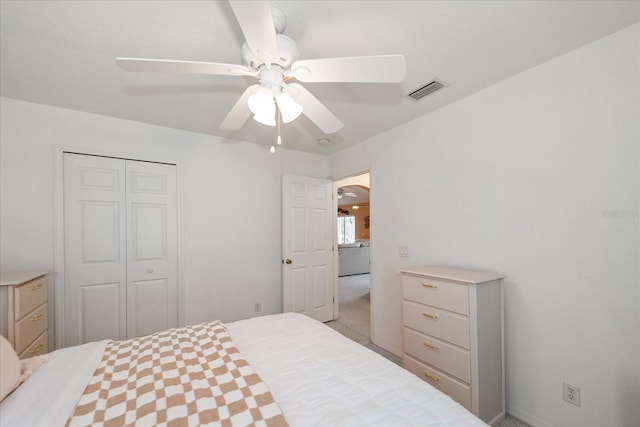 4219 Eastlake Ct, Port Charlotte, FL 33948 - bedroom featuring a closet, visible vents, ceiling fan, arched walkways, and carpet