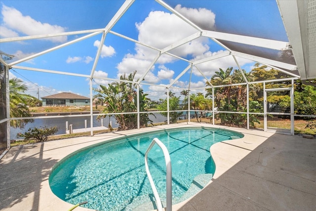 4219 Eastlake Ct, Port Charlotte, FL 33948 - outdoor pool featuring a patio area and glass enclosure