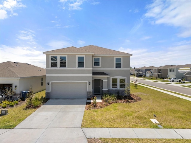 4405 Stargrazer Ct, Palmetto, FL 34221 - view of front facade with stucco siding, stone siding, concrete driveway, and an attached garage