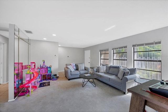 4806 Huntleigh Dr, Sarasota, FL 34233 - carpeted living area featuring visible vents and recessed lighting