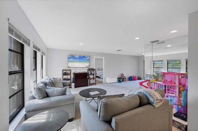 4806 Huntleigh Dr, Sarasota, FL 34233 - living room with recessed lighting and carpet floors