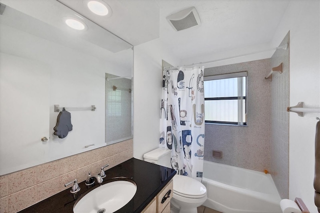4806 Huntleigh Dr, Sarasota, FL 34233 - full bath featuring toilet, vanity, shower / tub combo with curtain, and visible vents