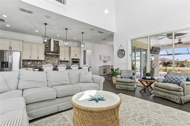 13721 Saw Palm Creek Trl, Lakewood Ranch, FL 34211 - living area featuring visible vents, wood finished floors, and ceiling fan