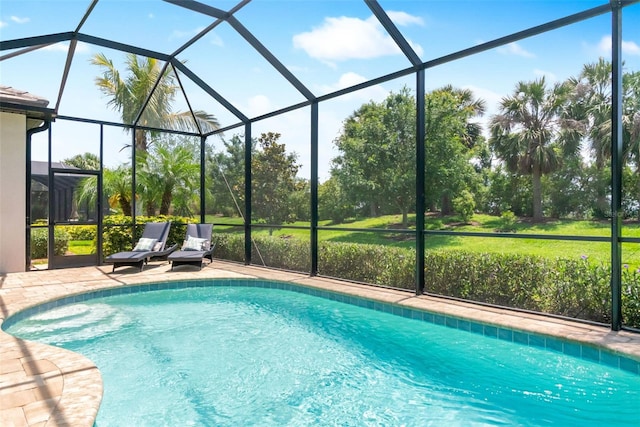 outdoor pool featuring a lanai and a patio