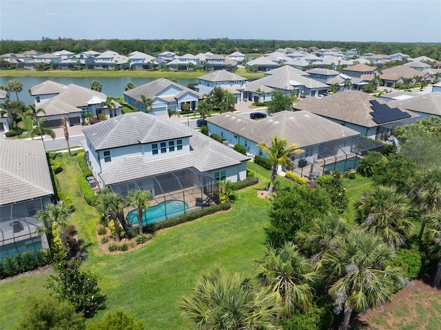 aerial view featuring a residential view and a water view