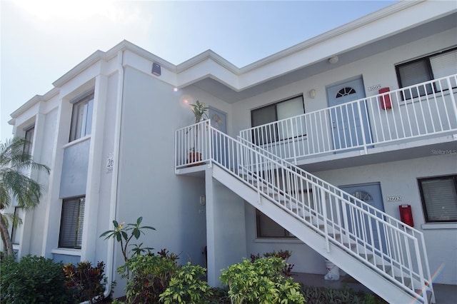 view of property with stairway