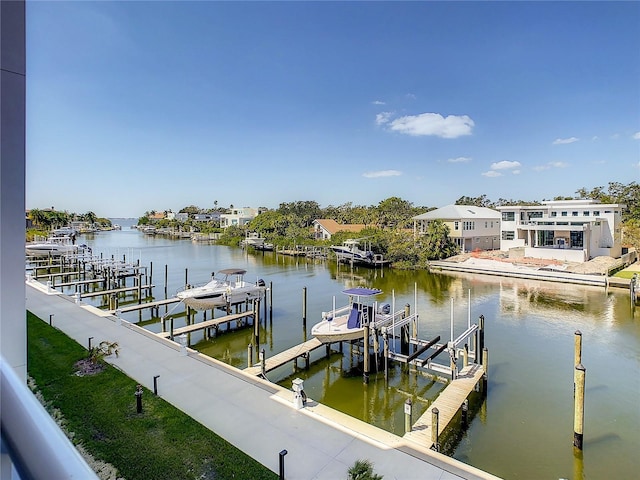 view of dock featuring boat lift and a water view