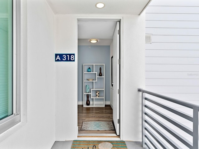 doorway to property with visible vents