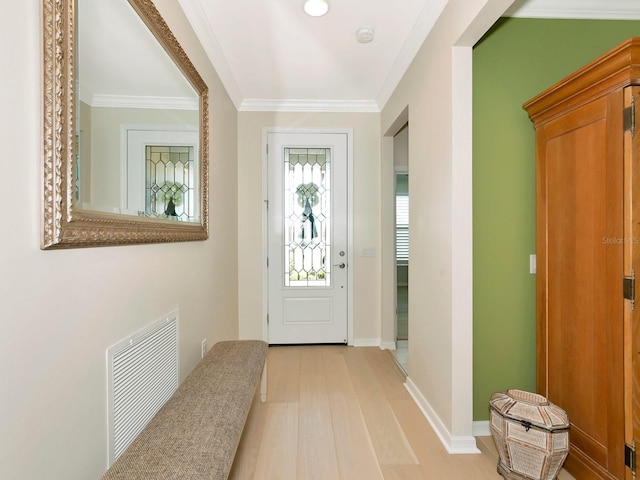 5952 Snowy Egret Dr, Sarasota, FL 34238 - entrance foyer with light wood-style flooring, crown molding, baseboards, and visible vents