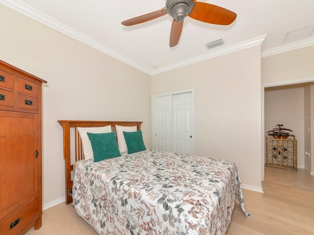 5952 Snowy Egret Dr, Sarasota, FL 34238 - bedroom with baseboards, a closet, and ornamental molding