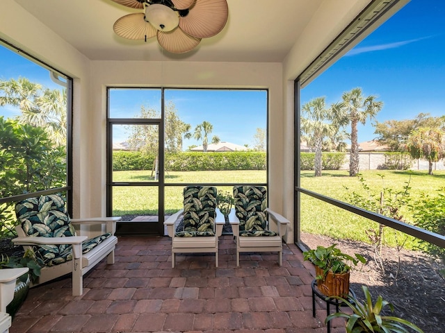 5952 Snowy Egret Dr, Sarasota, FL 34238 - sunroom with a healthy amount of sunlight and a ceiling fan