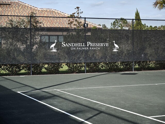5952 Snowy Egret Dr, Sarasota, FL 34238 - view of sport court featuring fence