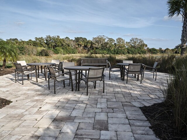 5952 Snowy Egret Dr, Sarasota, FL 34238 - view of patio / terrace featuring outdoor dining space