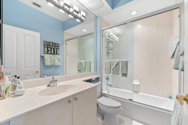 bathroom featuring vanity, enclosed tub / shower combo, tile patterned flooring, toilet, and visible vents