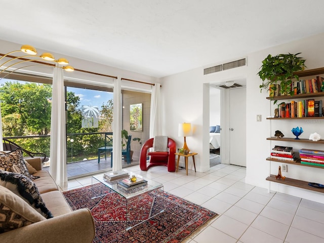living room with tile patterned floors and visible vents