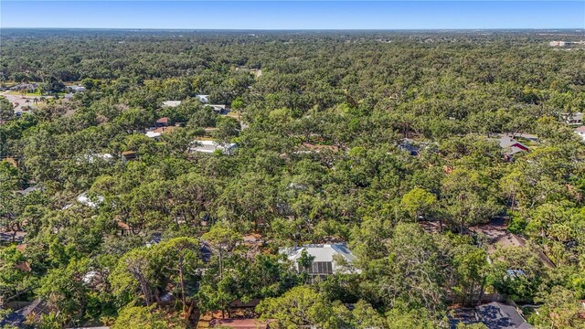 bird's eye view featuring a view of trees