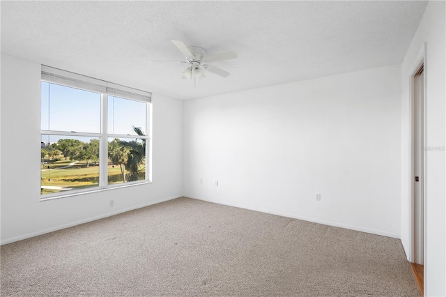 4570 Pinebrook Cir Unit 406, Bradenton, FL 34209 - carpeted spare room featuring baseboards and ceiling fan