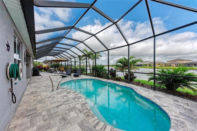 pool featuring a lanai and a patio