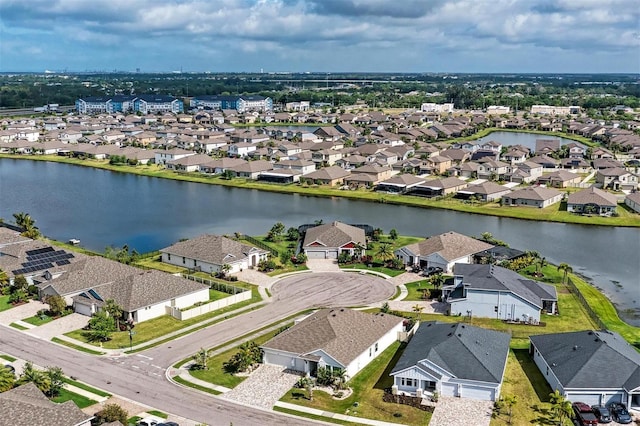 aerial view featuring a water view and a residential view