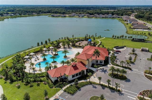 bird's eye view with a water view