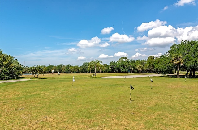 view of home's community featuring a lawn