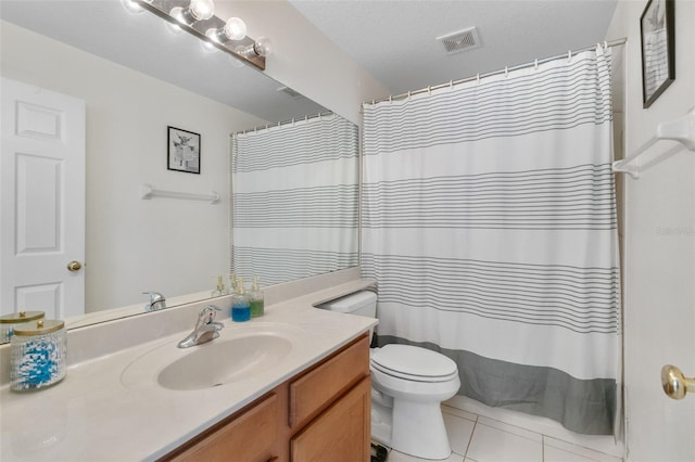 bathroom featuring visible vents, tile patterned flooring, vanity, toilet, and a shower with curtain