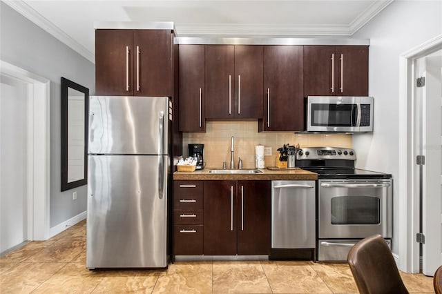 1020 Sun N Sea Dr Unit 104B, Sarasota, FL 34242 - kitchen with dark brown cabinetry, appliances with stainless steel finishes, ornamental molding, backsplash, and a sink