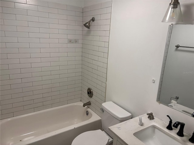 full bath featuring toilet, vanity, and shower / tub combination