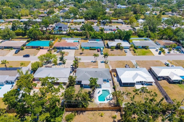 birds eye view of property with a residential view