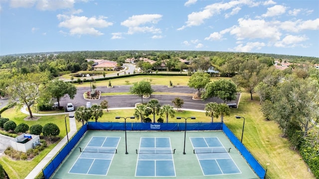 view of sport court with fence