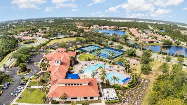 bird's eye view with a water view