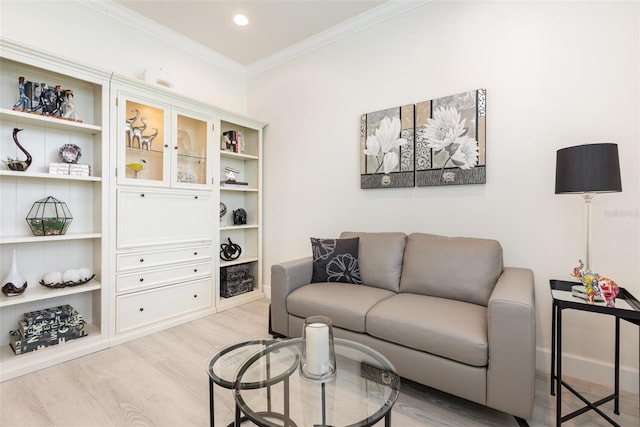 2705 Taheebo Way, North Port, FL 34289 - living area featuring light wood-style floors, crown molding, and recessed lighting