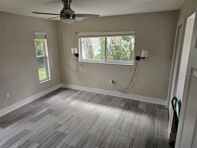 1654 Blakemore Ln, Sarasota, FL 34231 - empty room featuring a ceiling fan, baseboards, and wood finished floors