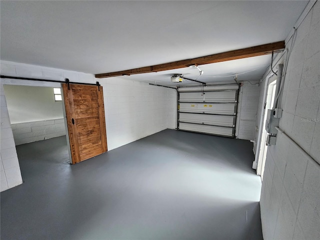 1654 Blakemore Ln, Sarasota, FL 34231 - garage with a garage door opener and concrete block wall