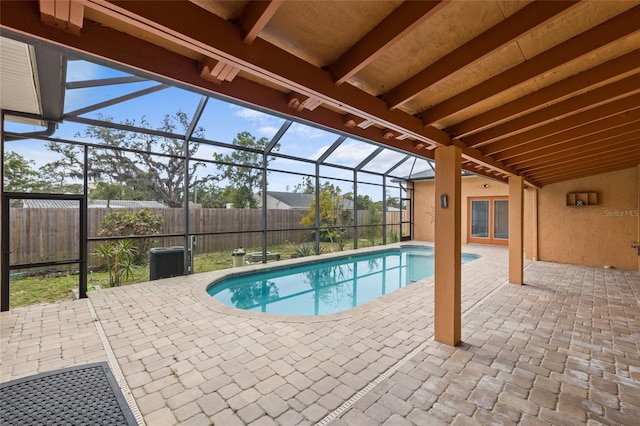 1828 Mova St, Sarasota, FL 34231 - view of swimming pool with a patio area, a lanai, and a fenced backyard