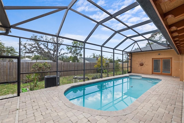 1828 Mova St, Sarasota, FL 34231 - view of pool featuring a fenced backyard, a patio area, and glass enclosure