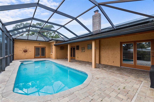 1828 Mova St, Sarasota, FL 34231 - swimming pool featuring a patio area, french doors, and a lanai